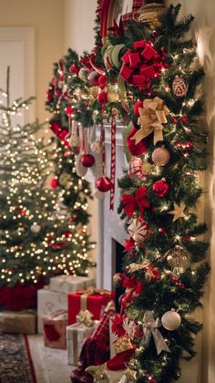 christmas tree decorated with red, gold and green ornaments in front of a fire place