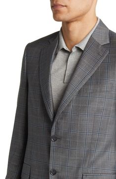 A classic plaid complements this tailored sport coat crafted from rich wool. 30" length (size 40) Notched lapels Lined 100% wool Dry clean Made in Portugal Elegant Plaid Blazer With Notch Lapel, Tailored Plaid Formal Outerwear, Formal Tailored Plaid Outerwear, Tailored Plaid Outerwear For Formal Occasions, Elegant Plaid Sport Coat With Suit Collar, Timeless Plaid Wool Blazer, Fitted Plaid Sport Coat For Semi-formal Occasions, Semi-formal Fitted Plaid Sport Coat, Classic Plaid Suit With Hidden Button Closure