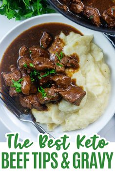 a white plate topped with meat and mashed potatoes next to a skillet filled with gravy