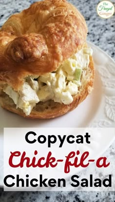 a chicken salad sandwich on a croissant with the title copycat chick - fil - a chicken salad