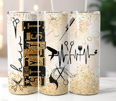 three canisters with scissors, scissors and hairdryers on the inside are decorated with gold sprinkles