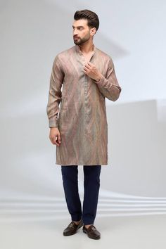 Taupe silk kurta with thread and jaal embroidery. Comes with blue cotton silk pant. - Aza Fashions Straight Kurta In Raw Silk With Naqshi Detail, Festive Slub Silk Kurta With Naqshi Detail, Raw Silk Straight Kurta With Naqshi, Festive Slub Silk Kurta With Naqshi, Festive Cotton Silk Kurta With Naqshi Detail, Traditional Slub Silk Kurta With Naqshi Details, Traditional Slub Silk Kurta With Naqshi, Silk Kurta With Naqshi For Festivals, Traditional Naqshi Slub Silk Kurta