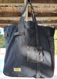 Recycled Denim Tote Bag - Etsy Everyday Handmade Recycled Denim Bag, Rectangular Recycled Denim Bag With Pockets, Upcycled Dark Wash Tote Bag, Everyday Recycled Denim Shoulder Bag With Pockets, Recycled Denim Tote, Denim Tote Shoulder Bag For On-the-go, Recycled Denim Tote Shoulder Bag With Pockets, Denim Recycle, Upcycled Recycled Denim Tote Shoulder Bag