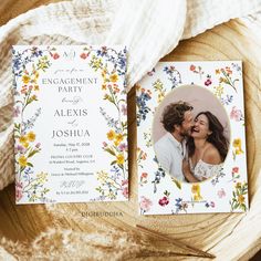 an engagement party with flowers on the front and back of it, next to a couple's photo