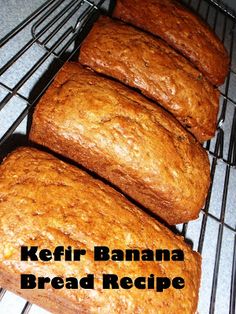 four pieces of bread sitting on top of a cooling rack next to the words kefir banana bread recipe