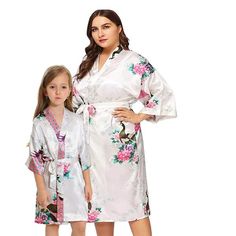 Stylish and trendy Mommy and Me Robes for women and girls These robes are great for any occasion, whether for daily use, travel, spa parties, wedding, vacation and more Kids love dressing up like mommy, and its a great opportunity to share something special with your daughter, niece, goddaughter, granddaughter, sister and more Available for women in regular or plus sizes, from sizes 2 to 38, and for child from 2T to 14. Please use our specific size chart to get a great fit Robes feature a floral Long Silk Kimono, Baby Girl Swaddle, Stylish Pajamas, Nightgown Sets, Plus Size Robes, Matching Robes, Kids Robes, Girls Robes, Floral Robes