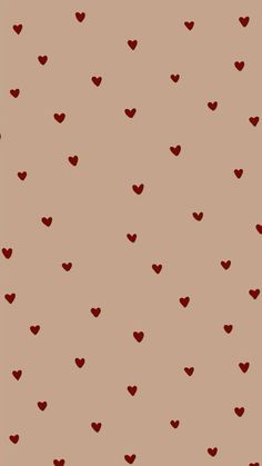 a brown and red wallpaper with hearts in the shape of heart shapes on it