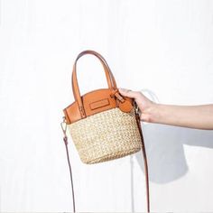 Summer Travel Shoulder Bag In Light Brown, Chic Brown Shoulder Bag For Spring, Light Brown Woven Bags For Summer, Casual Light Brown Straw Bag For Vacation, Light Brown Bucket Straw Bag For Vacation, Light Brown Bucket Straw Bag For The Beach, Light Brown Bucket Straw Bag For Summer, Summer Light Brown Straw Bag With Braided Handles, Casual Brown Straw Bag For Vacation