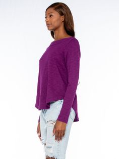 Shrunken Long Sleeve Bateau Neck Shirttail Tee. In Our Signature Slub Fabrication. Made in the USA. Model is wearing a size Small Fabric Content:100% Cotton Purple Cotton Top For Layering, Purple Crew Neck Top For Layering, Purple Relaxed Fit Crew Neck Blouse, Purple Relaxed Fit Long Sleeve Top, Purple Relaxed Fit Top For Fall, Purple Long Sleeve Relaxed Fit Top, Essential Tops, Magnolia Colors, Buy Clothes Online