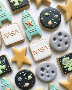 nasa cookies are arranged on a white surface