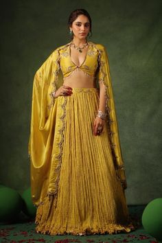 Yellow blouse with zardozi, sequin, pearl embroidery in floral pattern. Paired with crushed lehenga and scallop border embroidered dupatta. - Aza Fashions Elegant Designer Choli With Gota Work, Traditional Embellished Pre-draped Saree In Raw Silk, Embellished Raw Silk Sets For Wedding, Elegant Navratri Choli With Gota Work, Elegant Gota Work Choli For Navratri, Elegant Semi-stitched Gota Work Choli, Elegant Semi-stitched Choli With Gota Work, Embellished Raw Silk Set For Reception, Embellished Tissue Silk Sets For Wedding