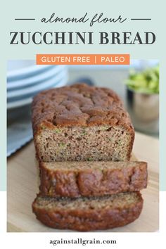 two slices of zucchini bread sitting on top of a cutting board