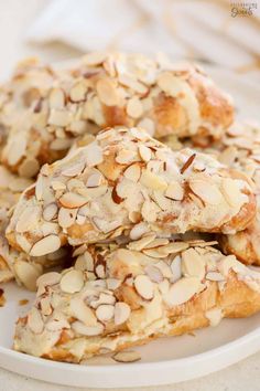 almond croissants on a plate ready to be eaten for breakfast or dessert