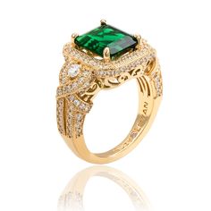 This sophisticated ring features a large emerald-cut green cubic zirconia center stone with a white cubic zirconia halo and pave side stones. There are dazzling round cut white cubic zirconia side stones, that continue down the band of this ring, hand-set in yellow plated sterling silver. This ring is designed by Suzy Levian with a message. By creating jewelry that is beautiful inside and out, Suzy Levian 's message is revealed through a hidden stone set in the shank of this ring to empower wome Yellow Plates, Ring Hand, Beautiful Inside And Out, Creating Jewelry, Pave Ring, Stone Settings, Green And White, Emerald Cut, Earring Necklace