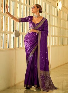 Wrap yourself in luxury with our Premium Purple Satin Silk Saree. The unique Latakan on the pallu, combined with the intricate zari weaving and border, creates a stunning piece fit for any wedding. Complete with a beautiful matching blouse, this saree is sure to make a statement. The unstitched blouse can be customized upto 44 inches. Do Note: All the accessories shown are for styling purpose only. Slight color variation may occur due to photographic reasons. Fall and Pico : Done Drapping Saree( Satin Silk Saree, Silk Drapes, Purple Weave, Lace Saree, Purple Saree, Orange Saree, Indian Saree Blouse, Kalamkari Saree, Satin Saree