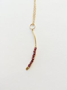 Garnet Necklace, Holiday Gift, January Birthstone, Garnet Jewelry, Gemstone NecklaceThe Arc of Garnet Necklace, is a unique piece that has been hand wrapped with garnets.+ Garnets. Arc Finding. 14K Gold Fill Chain & Lobster Clasp.+ Length:  Pick upon checkout.+ Necklace takes 1 day to make.+ Your jewelry will come in a jewelry box, tied with a ribbon.Thanks for looking ♥Check out our other necklaces:http://www.etsy.com/shop/laurastark?section_id=7493289Back to the main shop:http://www.lauras Red Garnet Gemstone Beads Jewelry, Red Hand Wrapped Necklace As Gift, Hand Wrapped Red Necklace As Gift, Red Hand Wrapped Necklace For Gift, Red Gemstone Necklace, Greenwich Ct, Garnet Necklace, Garnet Jewelry, Necklace Red