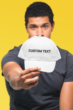 Elevate your style with our custom baseball cap, featuring a personalized design that combines comfort and individuality in every wear. Processing Times: We will process your order within 3 days and have it sent to our courier! How long does delivery take? We offer free worldwide delivery on all of our products, but please give us some leeway as we have multiple warehouses (UK, US, China & Australia), on average orders arrive within 7-15 business days. Our Guarantee: If anything is wrong with yo White Baseball Cap With Custom Logo For Sports Events, White Letter Print Dad Hat For Baseball Season, Personalized Cotton Baseball Cap As A Gift, Personalized Cotton Baseball Cap As Gift, Customizable Casual Dad Hat With Curved Bill, White Dad Hat With Letter Print For Sports Events, Customizable Snapback Dad Hat One Size, Customizable Snapback Dad Hat, Customizable Snapback Hat With Curved Brim