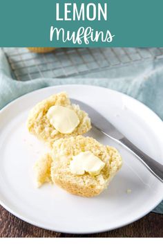 two lemon muffins on a white plate with a fork