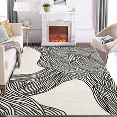 a living room with a fire place in the fireplace and zebra rug on the floor