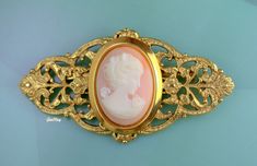 "Vintage unsigned brooch / pin carved cameo. The bust of a woman is prong-set in a decorative golden setting. he antique gold-plating is excellent also. It measures 2 3/4\" long and 1 3/8'' wide. The weight of it is 0.9 oz. Multiple Jewelry International shipping discount: 1-7 pieces of Single Jewelry = $24.99 We combine shipping, If you want to take advantage of the reduced shipping you must contact us before you pay for your items so we can send you a corrected invoice. Thank You for visiting Gold Cameo Brooch For Wedding, Wedding Brooches, Choker Collar Necklace, Victorian Revival, Wedding Brooch, Christmas Bracelet, Cool Necklaces, Pin Brooch, Glass Jewelry