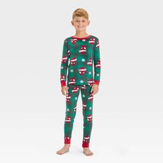 Your young superhero will love drifting off to dreamland during the holidays in this 2-Piece Spider-Man Snuggly-Soft Pajama Set. This set includes a long-sleeve sleep tee and pajama pants, both crafted from 100% polyester fabric for all-night comfort. Plus, they're designed with red ribbed hems, cuffs and ankles for a snug fit and neat finish. Featuring a plaid print in red and green, both pieces feature an allover graphic of Spider-Man wearing a Santa hat and spiderwebs for a festive, fan-favor Spider Man Pajamas, Family Pajama Sets, Soft Pajamas, Matching Family Pajamas, Pajama Pant, Kids Clothes Boys, Family Pajamas, Long Sleeve Pyjamas, Plaid Print