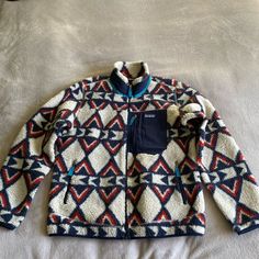 Patagonia Classic Retro X Fleece Jacket Sz L In Brass Hawk Pattern. Condition Is Excellent. From Patagonia: "A Warm And Windproof Layer That Rocks An Updated Retro Look From Patagonia’s Archives. New To Their Lineup Of Excellent Outerwear, The Classic Retro-X Jacket Takes The Look Of A Vintage Fleece Zip-Up (A Look Patagonia Pretty Much Invented About 35 Years Ago) And Pairs It Up With Modern Materials That Cut Wind, Trap Warmth, And Keep The Vibe Properly Chill. Multicolor Fleece Outerwear For Outdoor, Multicolor Fleece Outdoor Outerwear, Patagonia Long Sleeve Fleece Jacket For Hiking, Casual Multicolor Fleece Jacket For Outdoor, Blue Winter Hiking Fleece Jacket, Multicolor Long Sleeve Outerwear For Hiking, Casual Midweight Blue Fleece Jacket, Patagonia Blue Winter Outerwear, Blue Patagonia Outerwear With Pockets