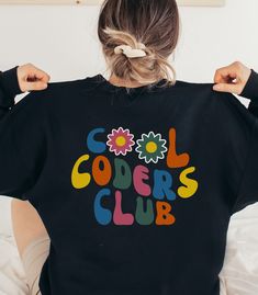 "\"Join the Cool Coders Club with our exclusive sweatshirt! Designed for coders, programmers, and tech enthusiasts, this sweatshirt features a bold and eye-catching design that proudly displays your passion for coding. Made with a soft and comfortable blend of cotton and polyester, it's perfect for lounging at home or for a casual day at the office. The sweatshirt boasts a unique and catchy slogan that sets it apart and makes a statement. It makes a great gift for any coder or programmer in your Office Tshirt Design, Coder Girl, Nerdy Style, Gifts For Programmers, Medical Coder, Catchy Slogans, Software Developer, Wavy Style, Software Engineer