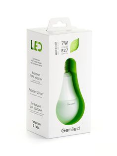 an open box with a green light bulb on it's side and the packaging inside