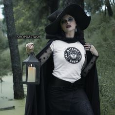 Witches Brew Halloween Unisex Or Womens Fitted And White Or Black Shirt! Thanks So Much, More Styles, Colors & More Available Upon Request! 1/$19 Or 2/$24 Add To Bundle For Special Price! Freebies With Every Purchase :) White Halloween Cosplay Top, White Top For Halloween Cosplay, Halloween Cosplay T-shirt With Letter Print, White Gothic T-shirt For Halloween, Gothic White T-shirt For Halloween, Eclectic Townhouse, Boss Tshirt, Zombie T Shirt, White Witch