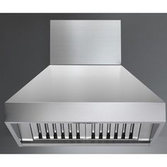 a stainless steel range hood mounted on the wall