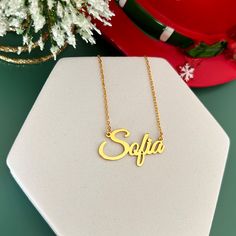 925 Sterling Silver Sofia name necklace for Christmas. A personalized jewelry for Christmas gift. This 14k gold name necklace is made of silver and gold plated according to order. You can have your name or any word you like with this custom name necklace. Make sure to check out my other name necklace styles. Sterling Silver Name Necklace, Custom Name Necklace, Personalized Jewelry, Baby Name Necklace, Birthday Gift Ideas, Christmas Gift For Her Just the way you want it. Use your name or a loved Customized Nameplate Necklace As A Gift, Customized Nameplate Necklace As Gift, Custom Nameplate Necklace For Gifts, Personalized Gold Necklace For Birthday Gift, Customizable Jewelry For Birthday And Christmas, Custom Name Necklace Nameplate For Gifts, Gold Hallmark Nameplate Necklace, Gold Nameplate Necklace With Hallmark, Nameplate Name Necklace Gift