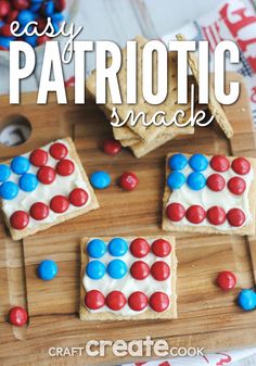 easy patriotic snack on a cutting board with red, white and blue candy in the middle