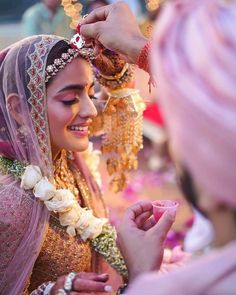 a bride and groom getting ready for their wedding ceremony at the same time in india