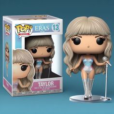 a pop vinyl figure is shown in front of a box with an image of taylor