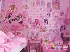 a bedroom with pink walls and lots of pictures on the wall, including teddy bears