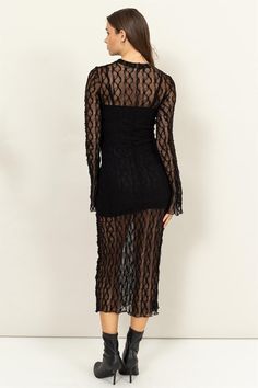 Sheer Elegance Black Lace Midi Dress TURN HEADS IN THIS LONG-SLEEVE LACE MIDI DRESS, FEATURING SHEER DETAILING AND A HIGH NECK. THE INTRICATE LACE DESIGN AND MIDI LENGTH OFFER A BLEND OF ELEGANCE AND SOPHISTICATION, MAKING IT PERFECT FOR FORMAL EVENTS OR A NIGHT OUT. PAIR IT WITH BOOTS AND MINIMAL ACCESSORIES TO COMPLETE THE LOOK.MODEL IS 5' 7" TALL, 32" CHEST, 25" WAIST AND 35" HIPS AND WEARING A SIZE SMALL Sheer Long Sleeve Lace Dress For Night Out, Sheer Long Sleeve Lace Dress For Date Night, Long Sleeve Sheer Lace Dress For Date Night, Black Lace Midi Dress With Sheer Sleeves, Black Lace Midi Dress With Sheer Details, Black Sheer Long Sleeve Maxi Dress, Black Fitted Lace Mesh Dress, Sheer Black Midi Dress For Fall, Black Long Sleeve Lace Maxi Dress