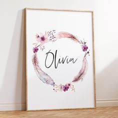 a white framed poster with the word julia written in cursive writing on it