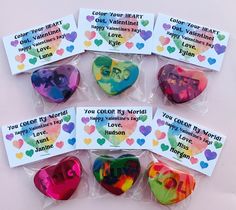 valentine's day candy hearts are packaged in cellophane and have the words you color my heart on them