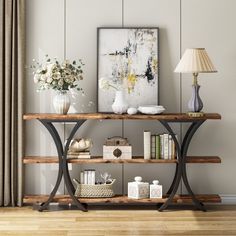 a wooden shelf with books and vases on it