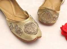 * Bridal wedding gold heart flat shoes as shown above. * comfortable in wear. * Perfect for every occasion. * best in quality. * Handmade by me. Please chose your size from the below chat. If you are not sure about your size, please let us know.We ll help you out. Sizes: - US 4.5 - EU 34 - 22.5 cms - US 5 - EU 35- 23cms - US 6 - EU 36- 23.5 cms - US 7- EU 37- 24 cms - US 7.5- EU 38- 24.5 cms - US 8.5- EU 39- 25 cms - US 9- EU 40- 25.5 cms - US 10- EU 41- 26 cms - US 11- EU 42- 26.5 cms ** Standa Wedding Flats With Zari Work And Round Toe, Festive Wedding Flats With Round Toe, Wedding Flats For Festivals Slip-on, Wedding Slip-on Flats For Festivals, Festive Wedding Slip-on Flats, Wedding Festivals Slip-on Flats, Gold Traditional Slip-on Flats, Traditional Gold Flats For Party, Wedding Flats With Gota Work And Round Toe