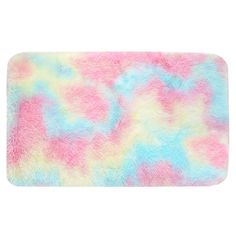 a pink, blue and yellow tie dye bath mat on a white background with the colors of