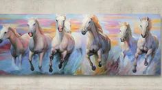 four white horses running in the wind on a canvas wall art print, ready to hang