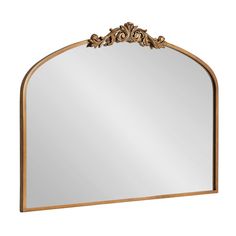 an ornate gold framed mirror on a white background