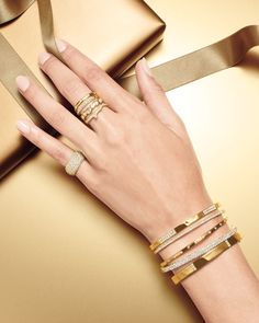 Gold bangles come in a wide array of designs, making them suitable for various occasions. Whether it’s a simple, minimalist band for everyday wear or an ornate, gem-studded piece for a special event, there’s a gold bangle to suit every style and need. Ippolita Ring, Ippolita Jewelry, Pave Diamond Band, Gold Diamond Band, Gold Band Ring, Diamond Rings Bands, Chic Jewelry, Hinged Bangle, Gold Collection