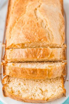 sliced loaf of bread sitting on top of a white plate