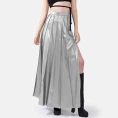 Step into effortless elegance with the Solace Vegan Leather Pleated Maxi Skirt in metallic silver. With a hidden zip closure and stylish golden embellishments, this skirt combines sophistication with a touch of luxury. The lightweight fabric drapes beautifully, offering a relaxed yet structured fit with just the right amount of stretch for comfort and durability. The vertical hand-pleating creates a flattering silhouette by elongating the lower body. Perfect for stylish occasions where comfort i Hand Pleating, Pleated Maxi Skirt, Pleated Maxi, Effortless Elegance, Draped Fabric, Lower Body, Independent Designers Fashion, Shirt Sale, Gifts For New Moms