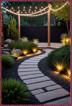 a garden with lights strung over the walkway