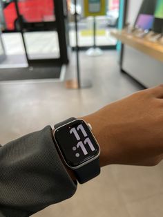 an apple watch on someone's wrist in a store