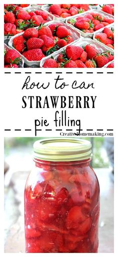 a jar filled with strawberries sitting on top of a table