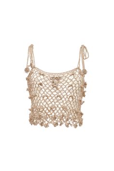 a crop top with crochet and tassels on the shoulders, in beige